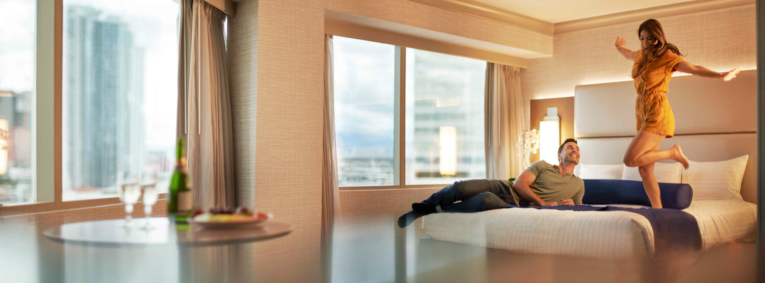 Couple enjoying their hotel room
